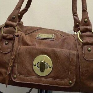 Brown punk leather zip fastening bag